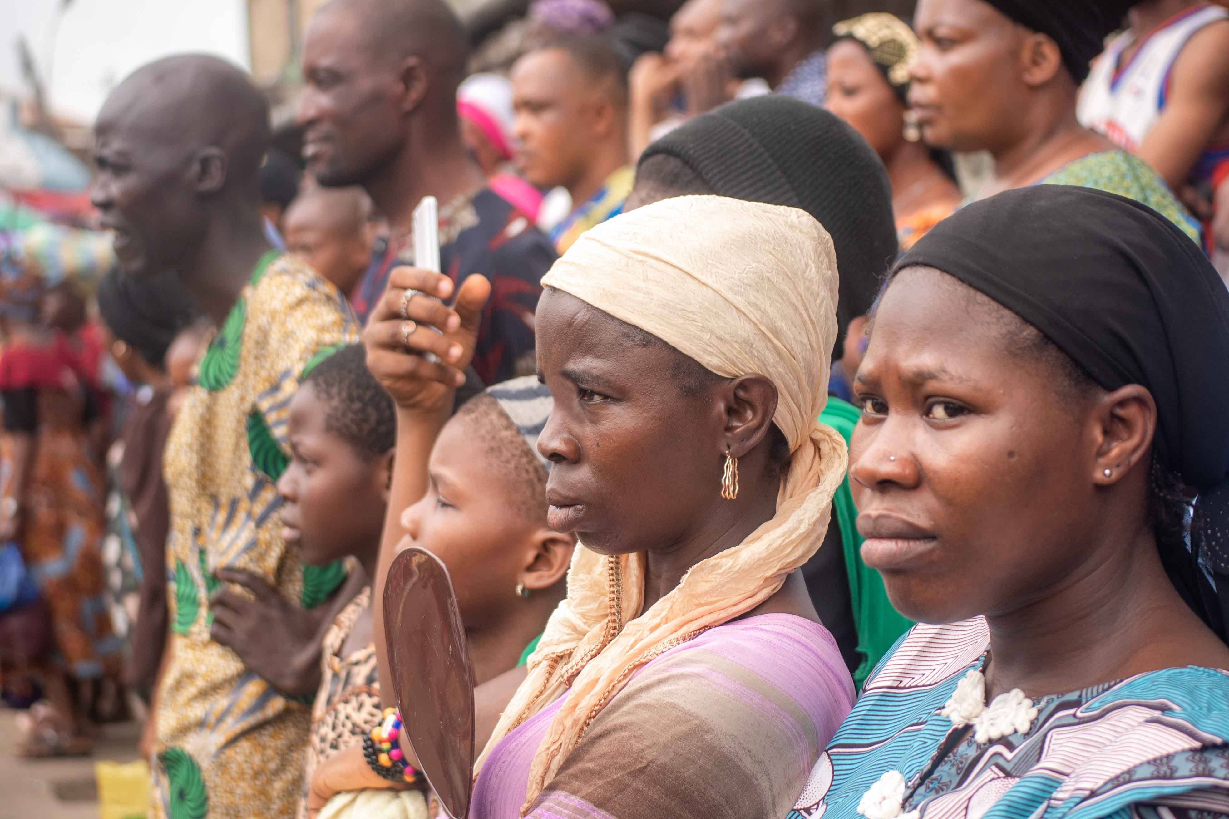The crowd looks on during a ritual procession re-enacting the death of Jesus in Nigeria's largest city, Oyo, Nigeria on March 27, 2024.
